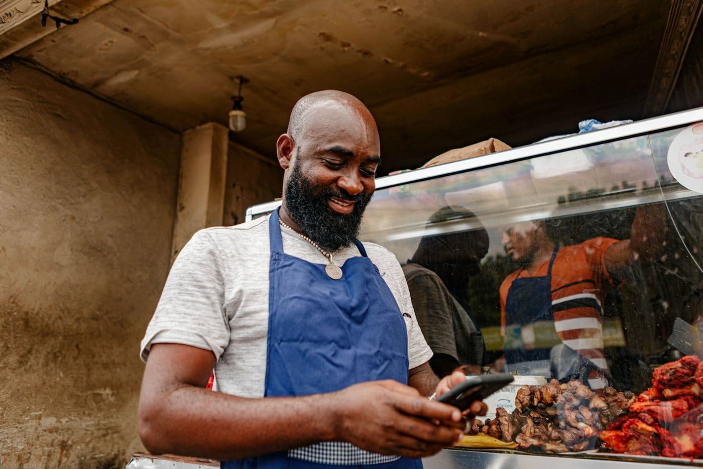 A smiling small business owner at work